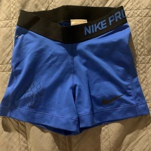 Blue Nike pro shorts